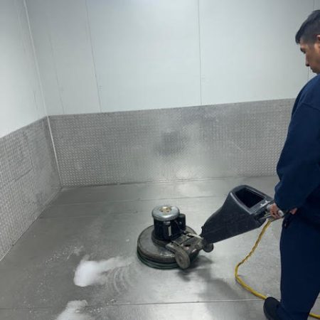 steam cleaning of a floor in a commercial kitchen